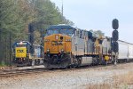 CSX ES-44AC #730 Takes a northbound out of the yard while CSX GP-38-2 #2803 waits to cross over & enter Collier Yard